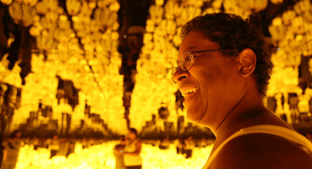 Patron at Yayoi Kusama exhibit at the DMA